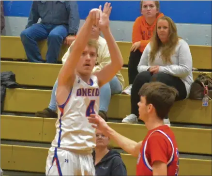  ?? PHOTO BY JOSHUA WAGNER ?? Gavin Stone (4) attempts a 3-PT shot against New Hartford.