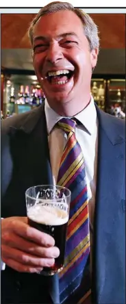  ??  ?? One for the road: Nigel Farage’s pub press conference soon descended into chaos