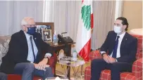  ?? (Dalati Nohra/via Reuters) ?? EUROPEAN UNION foreign policy chief Josep Borrell (left) meets with Lebanese Prime Minister-designate Saad al-Hariri in Beirut on Saturday.