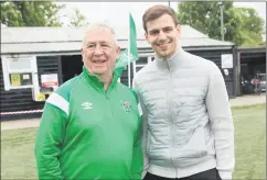  ?? ?? Tom Browne of the SFAI with Irish Internatio­nal Jason Molumby at the All-Ireland finals in Cahir Park last Sunday.