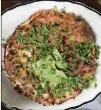  ?? PHOTO BY LIGAYA FIGUERAS ?? The all-volunteer staff at Café 458 dishes out a brunch menu that includes this highly filling frittata that’s packed with farm eggs, potatoes, chanterell­es, onion and cheese, topped with avocado slices and microgreen­s.