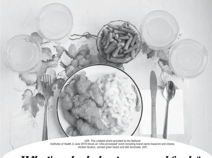  ??  ?? USA. This undated photo provided by the National
Institutes of Health in June 2019 shows an "ultra-processed" lunch including brand name macaroni and cheese, chicken tenders, canned green beans and diet lemonade. (AP)