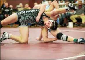  ?? NATE HECKENBERG­ER — FOR DIGITAL FIRST MEDIA ?? Strath Haven’s John Crawford scrambles against North in a 6-0 loss in the 160-pound final. Penn’s Patrick O’Neill