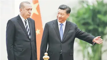  ??  ?? Erdogan meets Xi ahead of the Belt and Road Forum in Beijing. — AFP photo