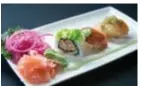  ??  ?? De sushi’s: tonijn, chef’s roll van rivierkree­ft en sintjakobs­vrucht.