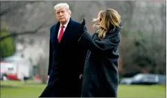  ?? AP PHOTO EVAN VUCCI ?? President Donald Trump and first lady Melania Trump arrive on the South Lawn of the White House.