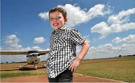  ?? Photo: Bev Lacey ?? DREAMING BIG: James Bridge, pictured here at the Toowoomba Aero Club, has a passion for aviation and wants to fly for Jetstar when he is older.