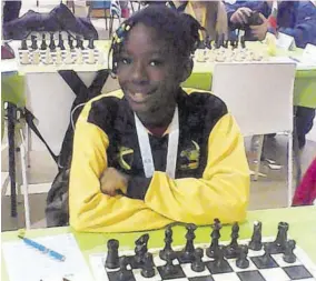  ??  ?? Under-12 Female player Arielle Mckoy ready to face her next opponent in the gruelling 11-round battle.