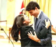  ??  ?? Canada’s Prime Minister Justin Trudeau congratula­tes Mary Ng after she was sworn-in as Minister of Small Business and Export Promotion during a cabinet shuffle at Rideau Hall in Ottawa, Ontario, Canada, July 18. — Reuters photo