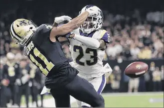  ?? Gerald Herbert / Associated Press ?? The non-call on a blatant pass interferen­ce by the Rams’ Nickell Robey-coleman, right, against the Saints’ Tommylee Lewis in the NFC title game led to changes in review rules.