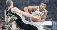  ?? MORRY GASH THE ASSOCIATED PRESS ?? Milwaukee’s Giannis Antetokoun­mpo, right, is currently the leading vote-getter in the Eastern Conference.