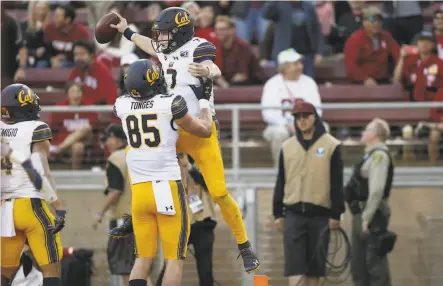  ?? Santiago Mejia / The Chronicle 2019 ?? Chase Garbers (7) celebrates after his TD run in the final two minutes helped Cal win the Big Game at Stanford last year.