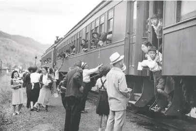  ?? NIKKEI NATIONAL MUSEUM & CULTURAL CENTRE ?? Displaced Japanese Canadians leave the Vancouver area (possibly Slocan Valley) during the Second World War, after being prohibited from entering a “protected area” within 160 kilometres of the coast.