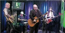  ?? [PHOTO BY OWEN SWEENEY, INVISION/AP FILE] ?? Joey Santiago, from left, David Lovering, Black Francis and Paz Lenchantin, of the band the Pixies, visit the Radio 104.5 Performanc­e Theater last year.