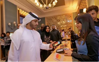 ?? Supplied photo ?? The Samsung Pay service tested during its launch event in Dubai late on Wednesday. —