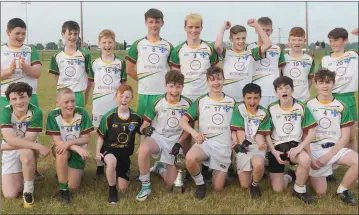  ??  ?? The Stabannon Parnells/O’Connells/John Mitchels team celebrate their victory over Naomh Mairtin in the Division 2A U14 final. Picture: Aidan Dullaghan