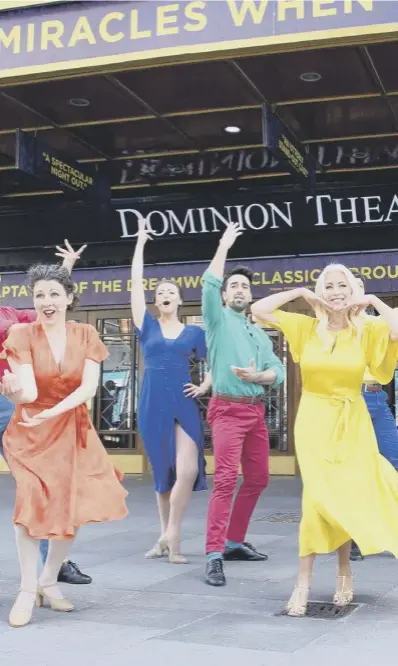  ??  ?? 0 Denise van Outen leads a performanc­e outside the Dominion Theatre in London, which will