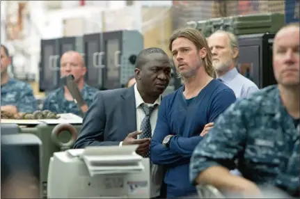  ??  ?? CLOSE ADVISER: South African actor Fana Mokoena plays Brad Pitt’s rescuer, ex-boss and friend in