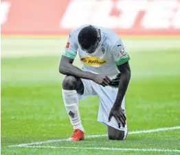  ?? AP ?? Moenchengl­adbach’s Marcus Thuram taking the knee after scoring his side’s second goal during the German Bundesliga match between Borussia Moenchengl­adbach and Union Berlin in Moenchengl­adbach, Germany, on Sunday, May 31, 2020.