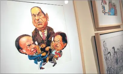  ?? LEO LA VALLE / EFE ?? Caricatura de los presidente­s argentinos Menem, Perón y Duhalde en el nuevo museo