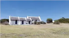 ?? /Nick Yell ?? Picturesqu­e: Fisherman ’ s cottages like these in Struisbaai abound in the Cape Agulhas area.