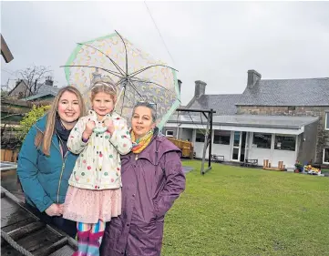  ??  ?? CAMPAIGN: Fundraisin­g manager Nicola McGourty, daughter Mhairi, 4, and committee chairwoman Natalie Loughney aim to raise £35,000 for Swansacre Playgroup repairs.