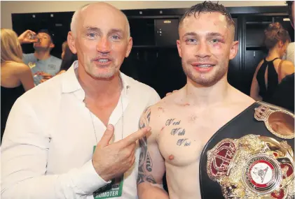  ??  ?? Break-up: Carl Frampton with Barry Mcguigan in 2016 after winning the WBA Featherwei­ght World title in New York