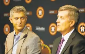  ?? KAREN WARREN/HOUSTON CHRONICLE ?? New baseball operations chief Mike Elias, left, addressing the media with Astros general manager Jeff Luhnow, inherits an Orioles minor league system that has been replenishe­d to some degree and will have the top choice in June’s first-year player draft.