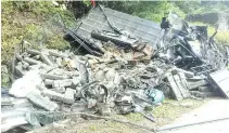  ??  ?? The wrecked truck at the scene of the crash at Ranau-Kota Kinabalu road.