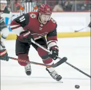  ?? AP FILE ?? Arizona Coyotes left wing Taylor Hall skates with the puck against the Minnesota Wild on Dec. 19, 2019.