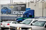  ?? JEFF SWENSEN / GETTY IMAGES ?? President Donald Trump told people at a rally last summer near this Lordstown, Ohio, General Motors plant not to sell their homes as jobs “are all coming back.” GM now has plans to idle this plant.