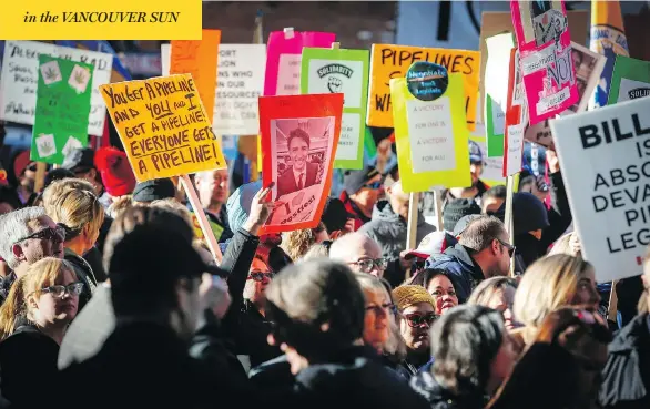  ?? JEFF MCINTOSH/THE CANADIAN PRESS ?? Calgarians made their feelings clear on Thursday as they protested outside the venue where Prime Minister Justin Trudeau addressed the Calgary Chamber of Commerce.