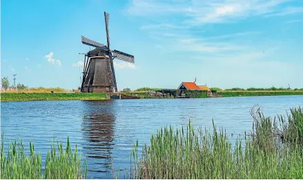  ??  ?? Before you hit Amsterdam, you’ll see inside the Netherland­s’ famous 18th-century Kinderdijk windmills.