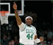  ?? MATT STONE / BOSTON HERALD ?? Robert Williams celebrates in the first half of Game 4 of the Celtics’ 102-82 win in the Eastern Conference Finals against the Miami Heat at TD Garden on Monday.