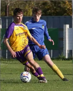  ??  ?? Niall Connolly of the Wexford Football League is tracked by Luke Kearney of Wicklow in Ferrycarri­g Park on Saturday.