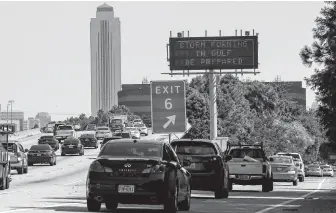  ?? Godofredo A. Vásquez / Staff photograph­er ?? An electronic sign on West Loop 610 casts a warning for motorists to be ready for Tropical Storm Barry to possibly hit the area, but forecasts predict the storm won’t significan­tly impact Houston.