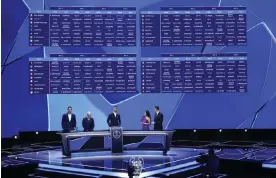  ?? Photograph: Sébastien Nogier/EPA ?? The screens showing all the group stage fixtures in the new-format Champions League after the draw in Monaco last month.