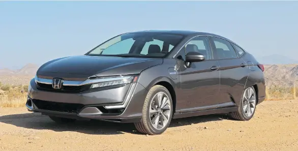  ?? PHOTOS: GRAEME FLETCHER/DRIVING ?? The electric motor in the 2018 Honda Clarity plug-in hybrid does most of the driving in normal situations.