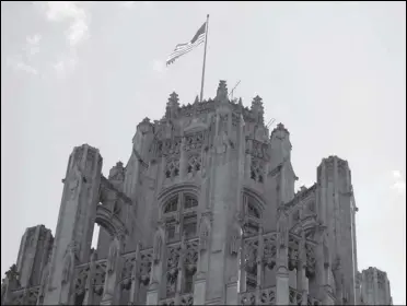  ?? ASSOCIATED PRESS ?? This April 25, 2016, file photo shows the top of the Tribune Tower on Michigan Avenue in Chicago.