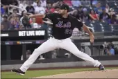  ?? BEBETO MATTHEWS — THE ASSOCIATED PRESS ?? The New York Mets’ David Peterson pitches to a Texas Rangers batter during the first inning Friday in New York.