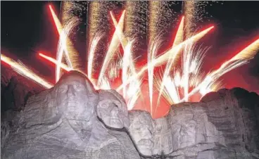  ?? BLOOMBERG ?? Fireworks go off during a holiday event at Mount Rushmore National Memorial in Keystone, South Dakota, on Friday, a day before the US celebrates its Independen­ce Day.