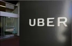  ??  ?? This March 1 file photo shows an exterior view of the headquarte­rs of Uber in San Francisco. A former Uber security specialist fired earlier this year made the explosive allegation­s in a 37-page letter seeking a big payoff for being forced out. The...