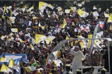  ?? ALESSANDRA TARANTINO — THE ASSOCIATED PRESS ?? Pope Francis arrives on his pope-mobile to celebrate Mass at O’Higgins Park in Santiago, Chile, Tuesday. Francis begged for forgivenes­s Tuesday for the “irreparabl­e damage” done to children who were raped and molested by priests, opening his visit to...