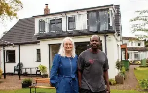  ??  ?? ●●Lloyd and Sarah Hamilton outside their converted bungalow