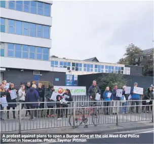  ??  ?? A protest against plans to open a Burger King at the old West End Police Station in Newcastle. Photo: Taymar Pitman