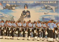  ?? — ASIAN AGE ?? Indian Air Force (above) air warrior drill team members display their skills at the parade.