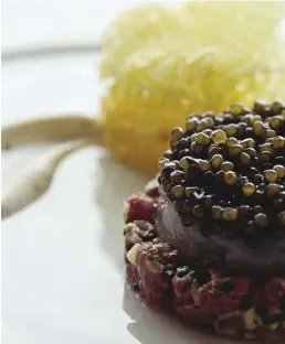  ??  ?? Caviar beef tartare with pomme gaufrette at Le Bernardin