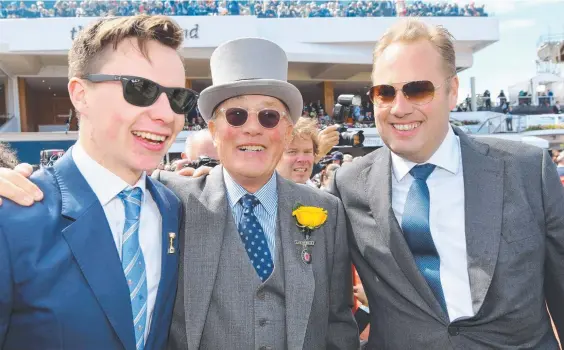  ?? Picture: GETTY IMAGES ?? Trainer Joseph O'Brien, owner Lloyd Williams and Nick Williams were all smiles after Rekindling’s incredible win yesterday.