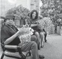  ?? Courtesy of Treemont ?? Treemont resident counselor Linda Parra celebrates the holiday spirit with resident Charles Stephens.