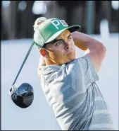  ?? Patrick Breen The Associated Press ?? Rickie Fowler follows through on his shot from the 17th tee Saturday in the third round of the Waste Management Phoenix Open at TPC Scottsdale.